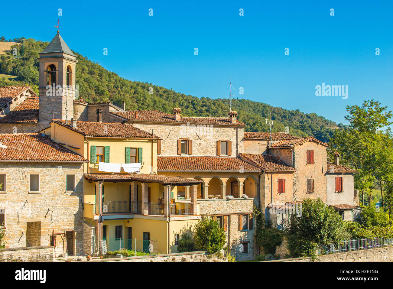 perched houses on ancient fortified ramparts of a medieval village on