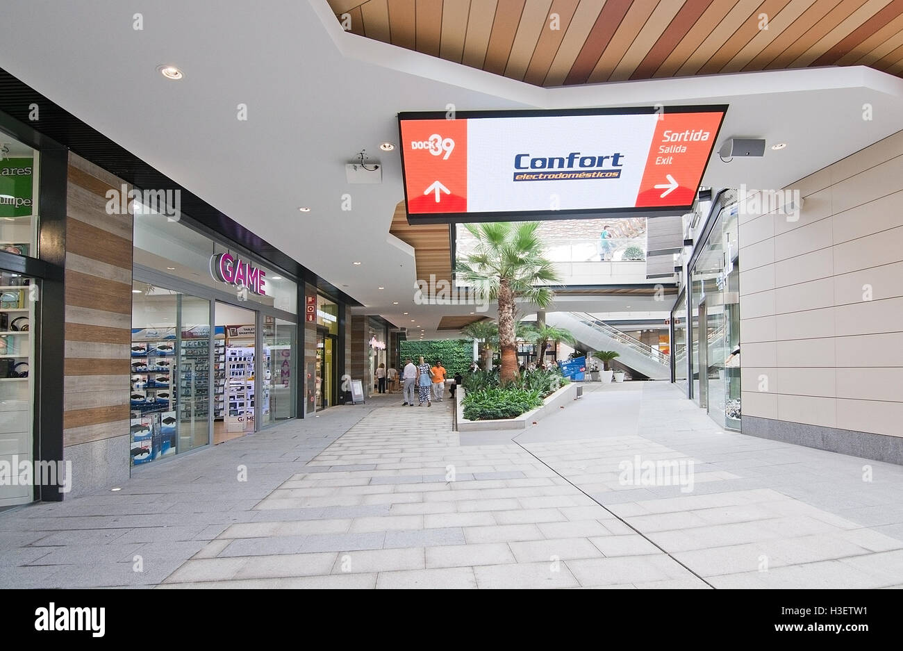 Confort store with shoppers in FAN Mallorca Shopping Centre on a sunny day on September 29, 2016 in Palma de Mallorca, Spain Stock Photo