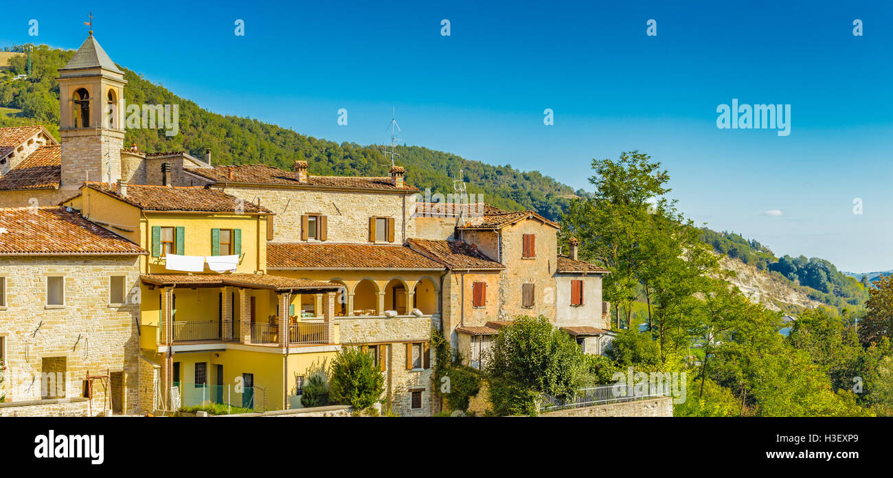 perched houses on ancient fortified ramparts of a medieval village on