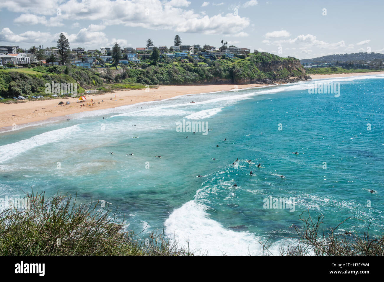 Looking down on Surfers at Warriewood Beach Sydney Australia Stock Photo