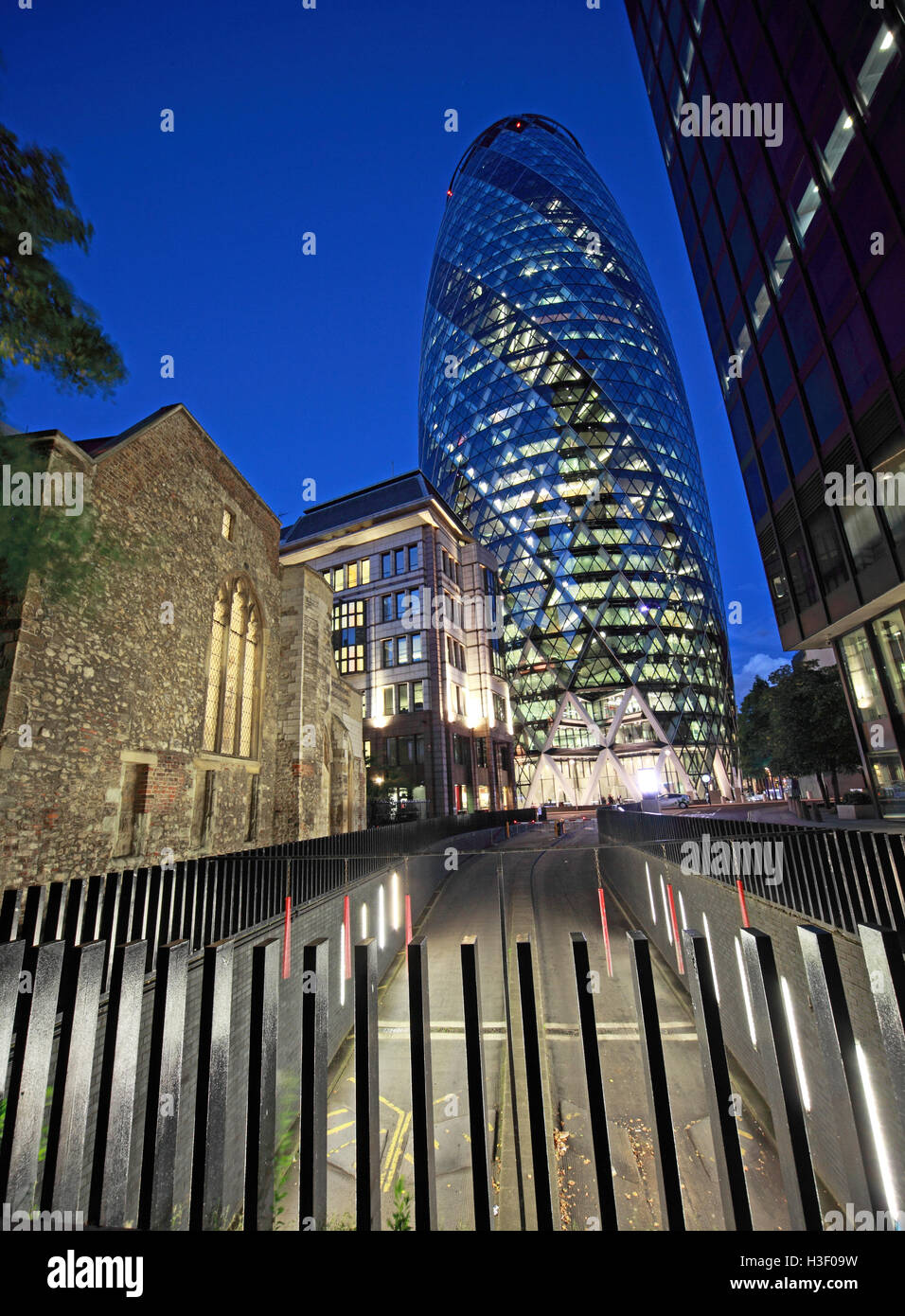 30 St Mary Axe,Gherkin,Swiss Re Building,City Of London,England at Dusk Stock Photo