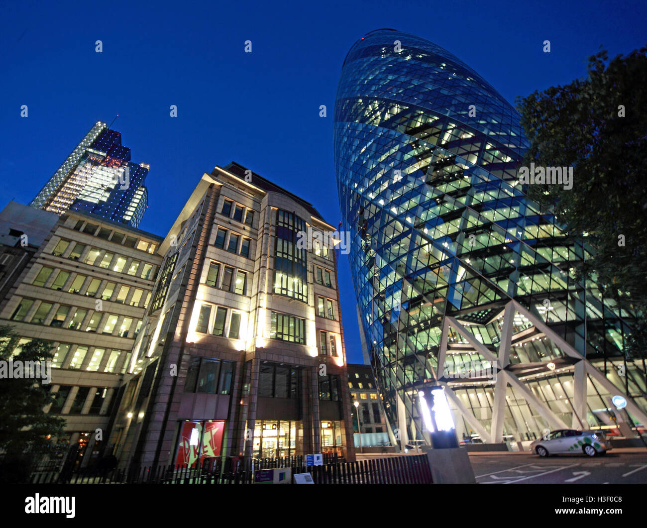 30 St Mary Axe,Gherkin,Swiss Re Building,City Of London,England at Dusk Stock Photo