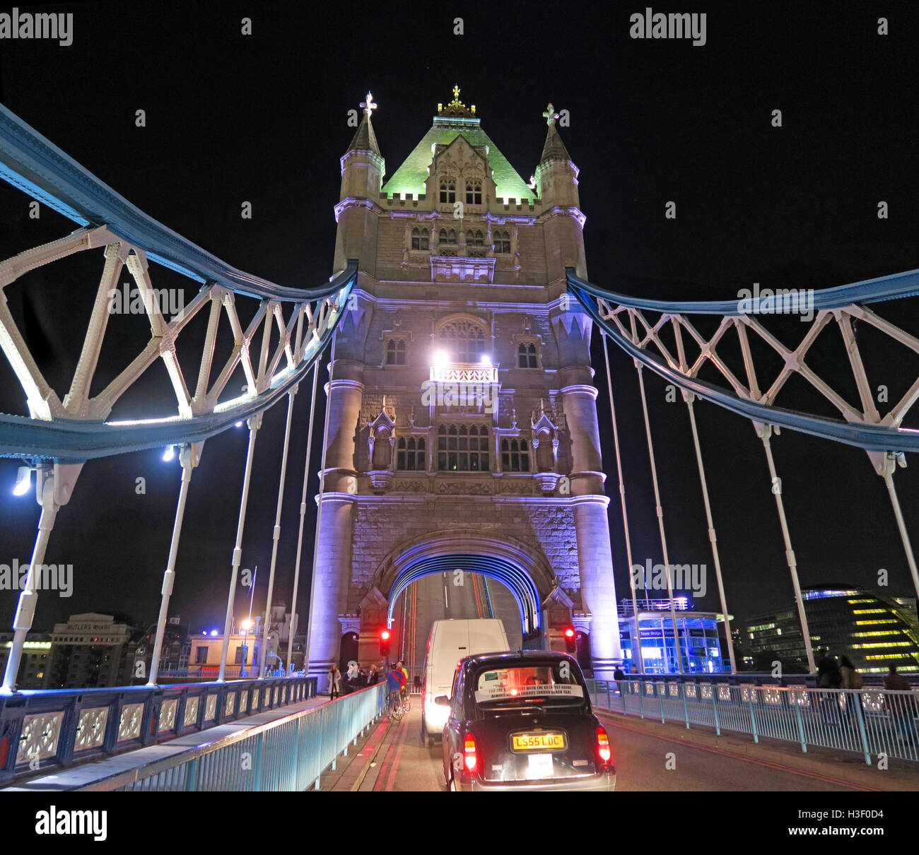 Tower Bridge Night repairs and opening traffic jam, over the Thames, London, England, with traditional black taxi cab Stock Photo