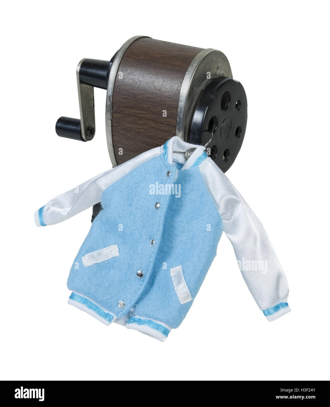 Student letterman jacket on a retro pencil sharpener - path included Stock Photo