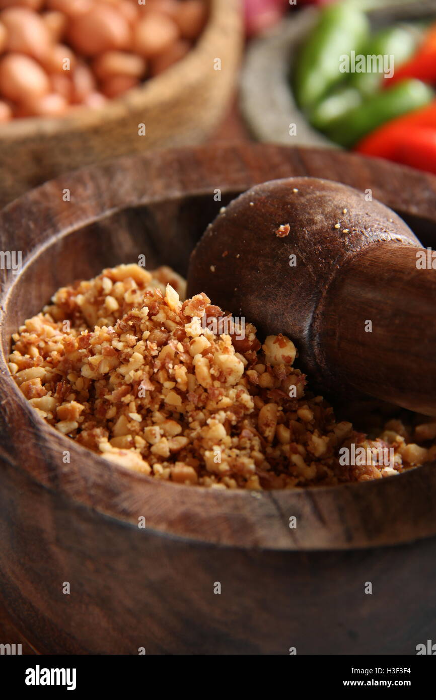 The seasoned ground peanuts used in Kupat Tahu Magelang, a signature dish of rice cake and bean curd from Magelang, Central Java, Indonesia Stock Photo