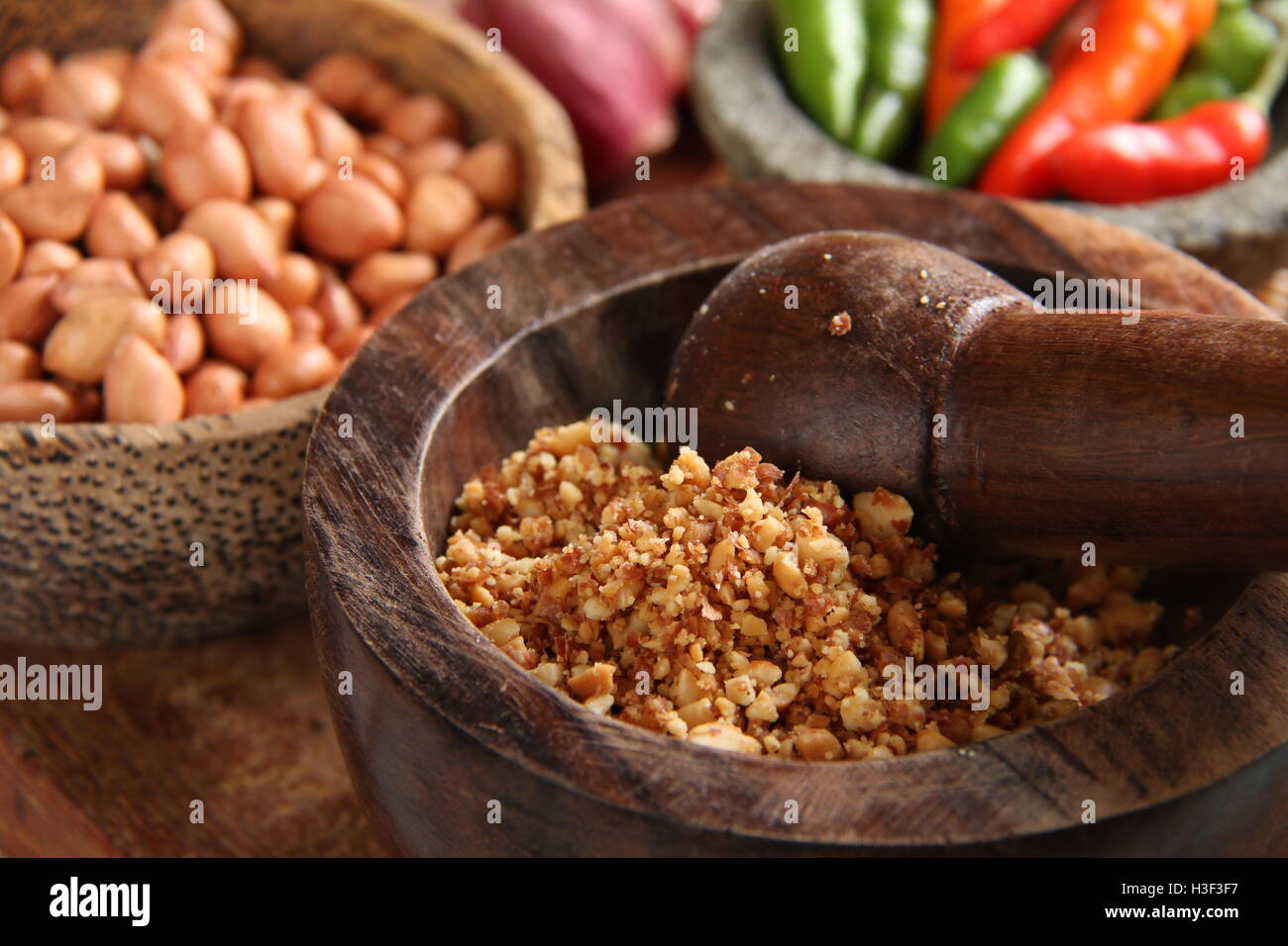 The seasoned ground peanuts used in Kupat Tahu Magelang, a signature rice-cake and bean-curd dish from Magelang, Central Java, Indonesia. Stock Photo