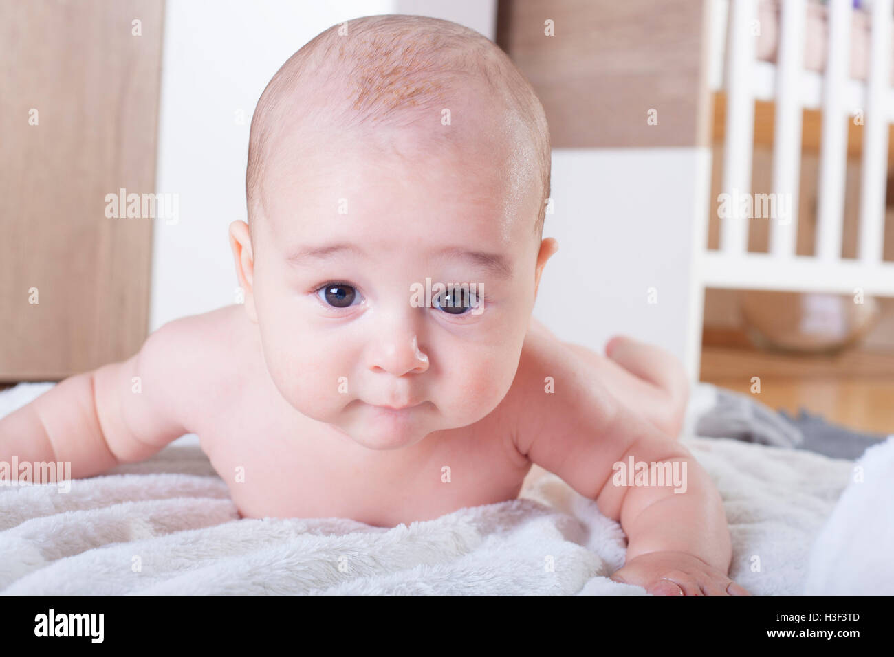 Cute baby on his tummy Stock Photo Alamy