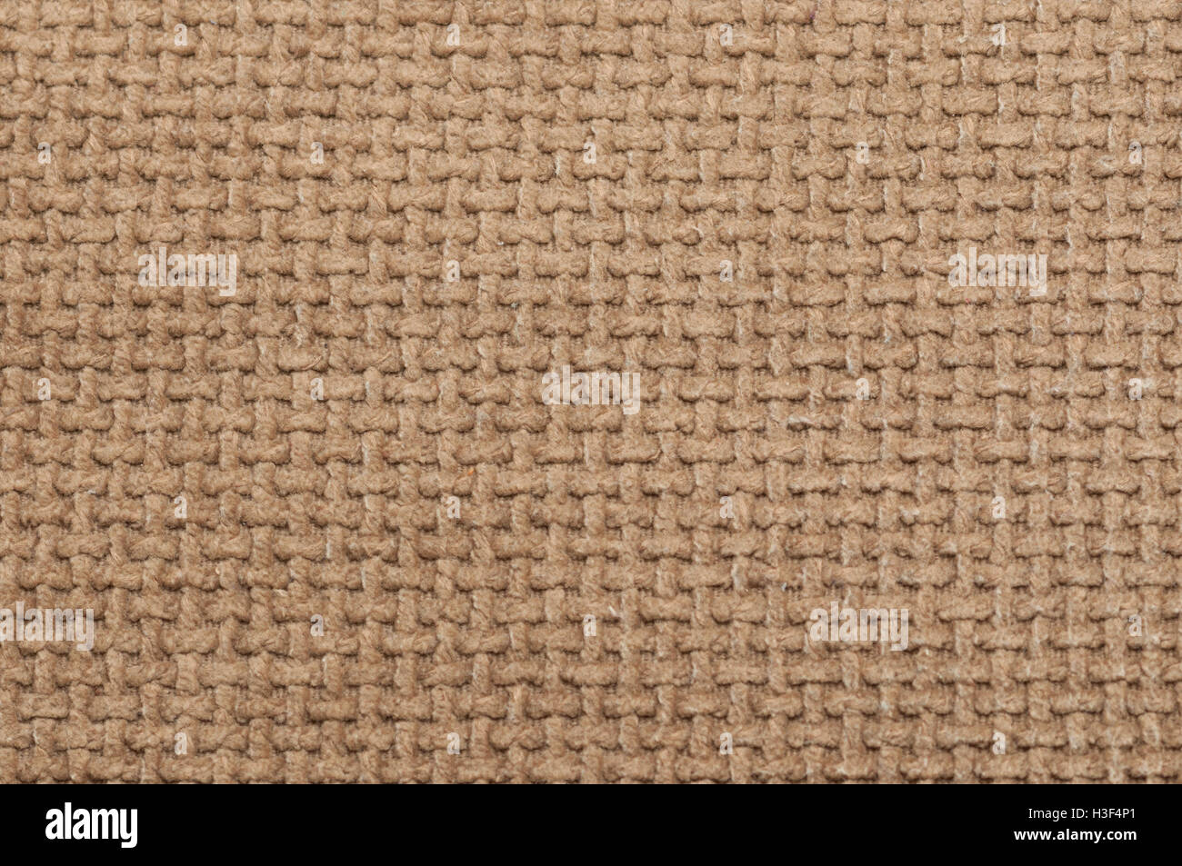 Background of brown fabric texture, close-up. Stock Photo