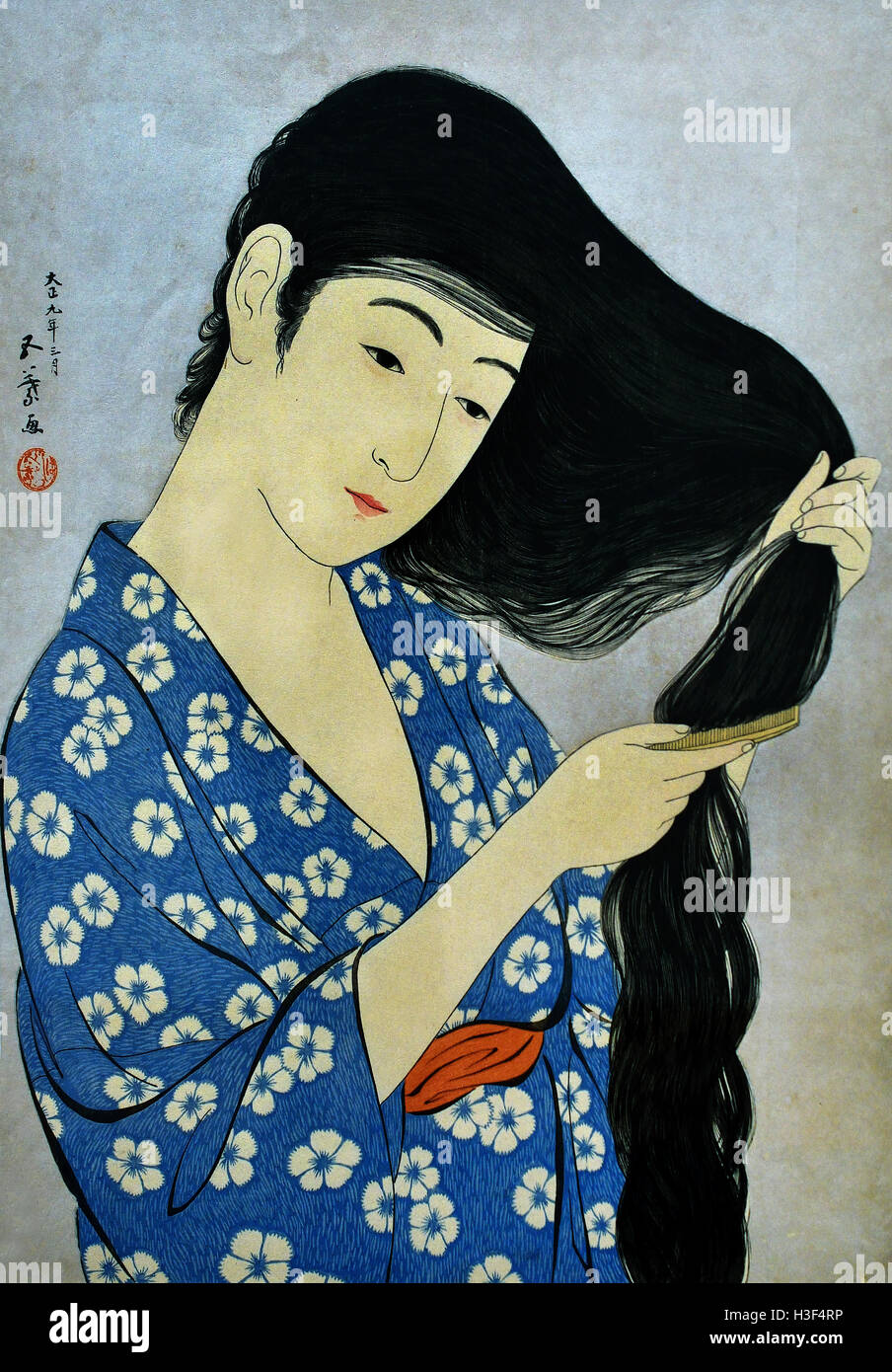 Woman Combing her Hair 1920 Hashiguchi Goyo 1880-1921 Tokyo Japan ( color woodcut on paper ) Stock Photo