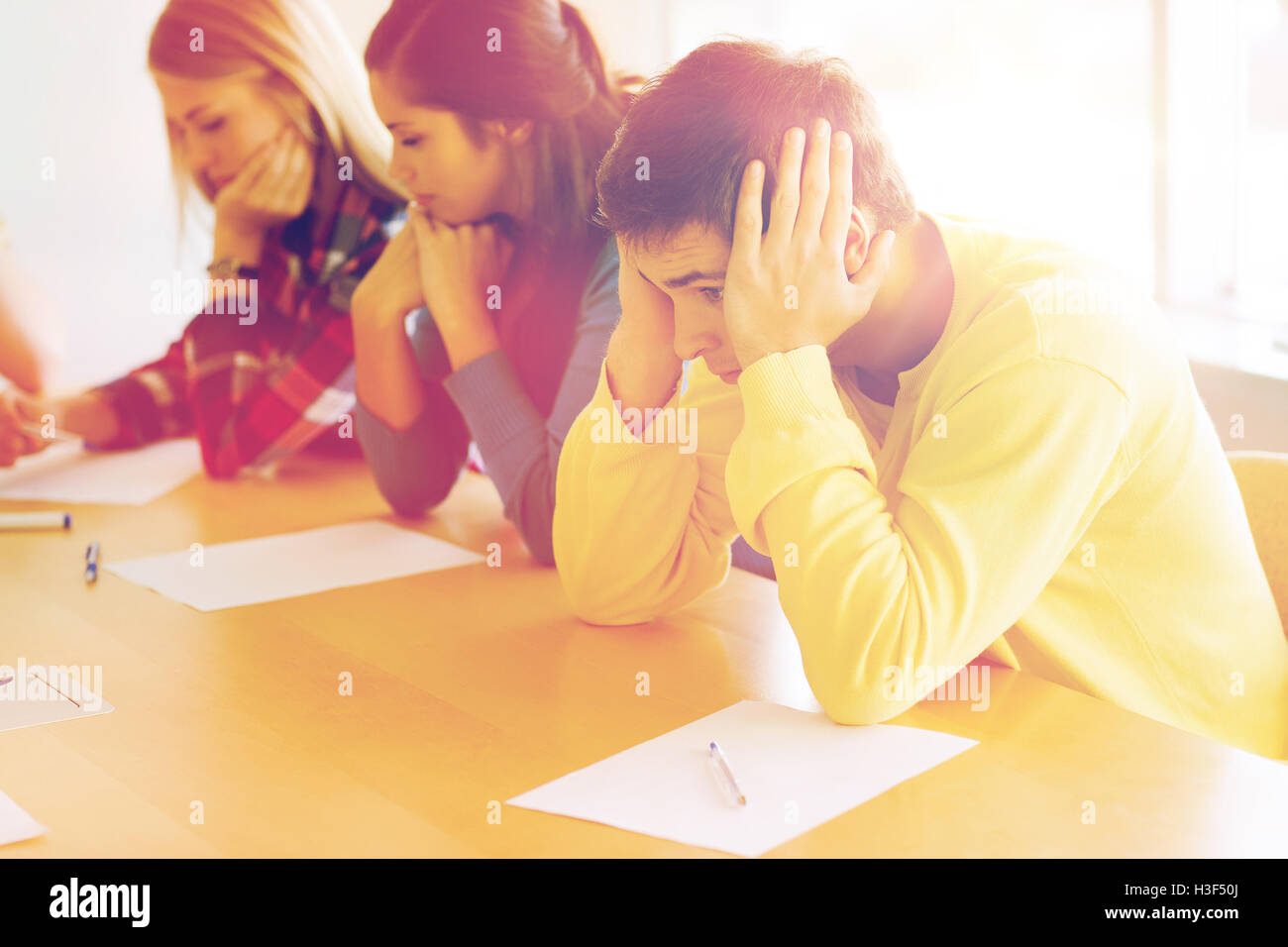 group of students with papers Stock Photo Alamy