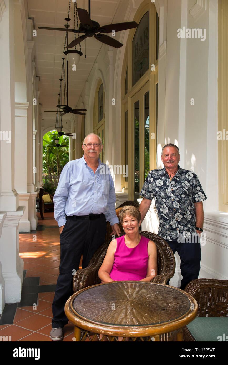 Singapore, Beach Road, Raffles Hotel, guests relaxing in bar verandah Stock Photo