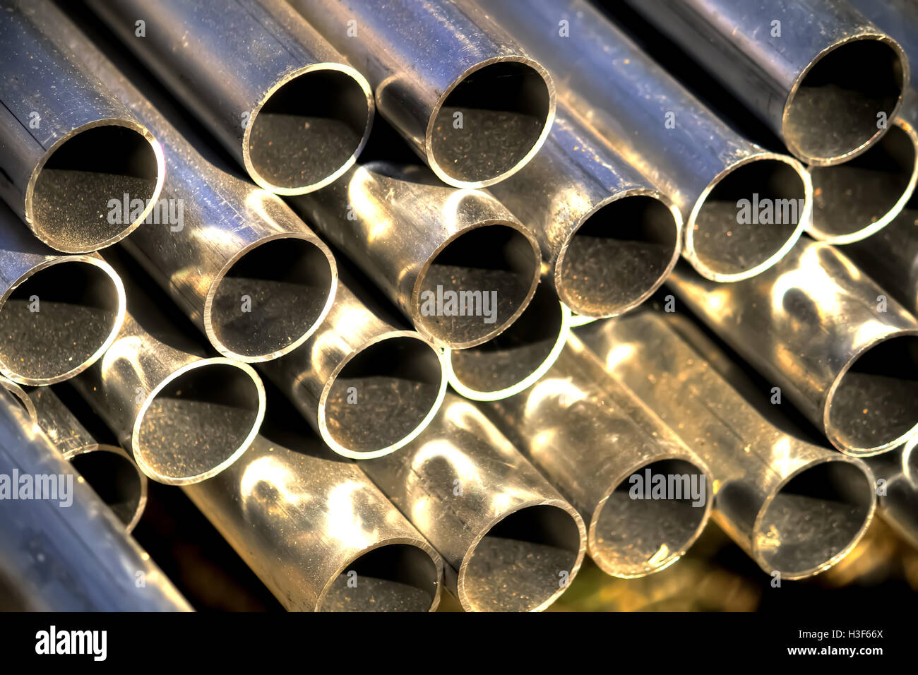 Stack of Many Pipes at the Construction Site Stock Photo - Alamy