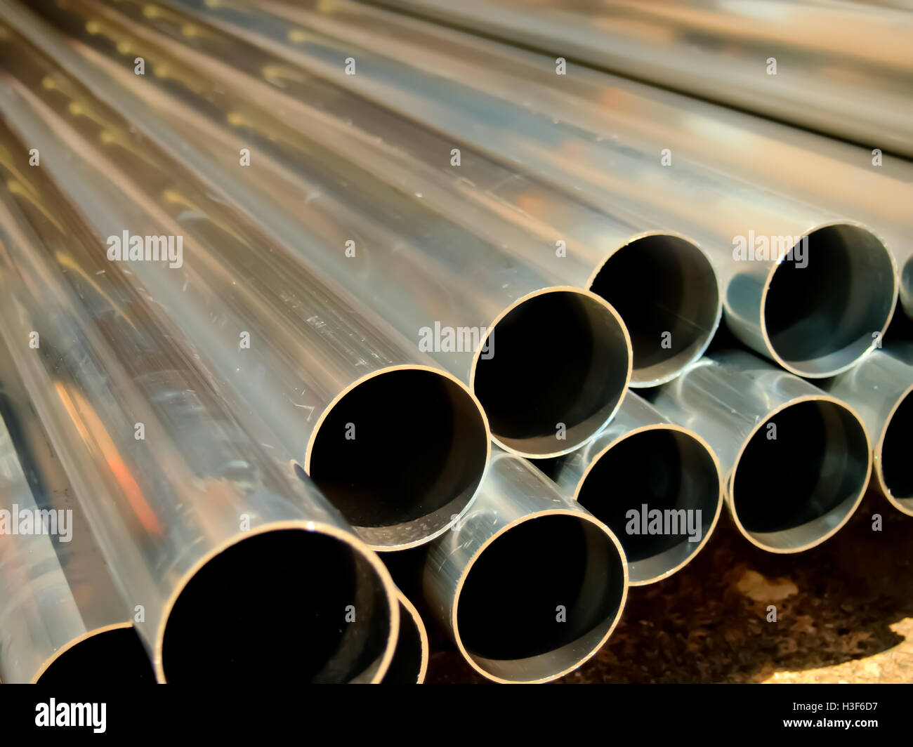 Stack of Many Pipes at the Construction Site Stock Photo - Alamy