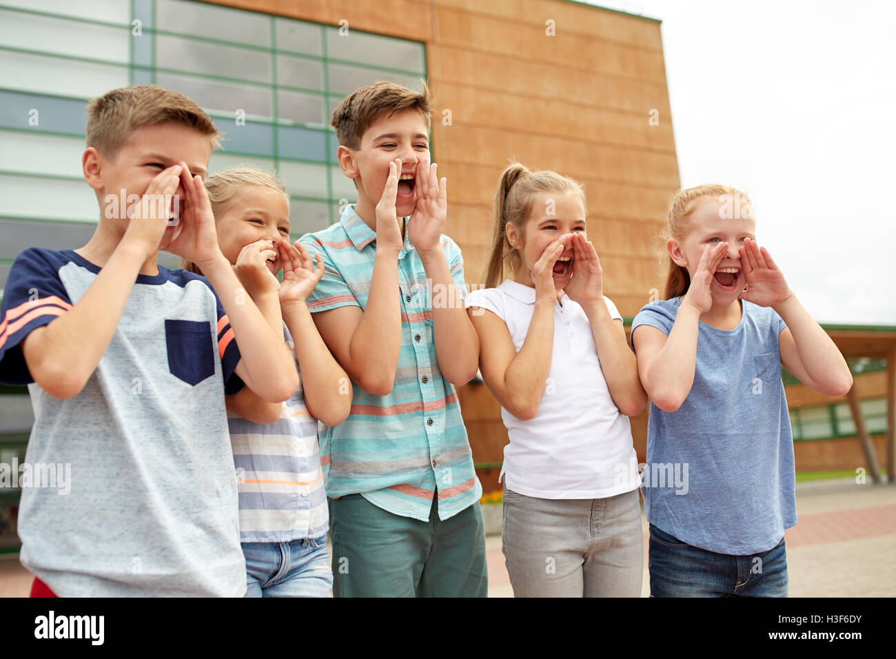 group of happy elementary school students Stock Photo - Alamy