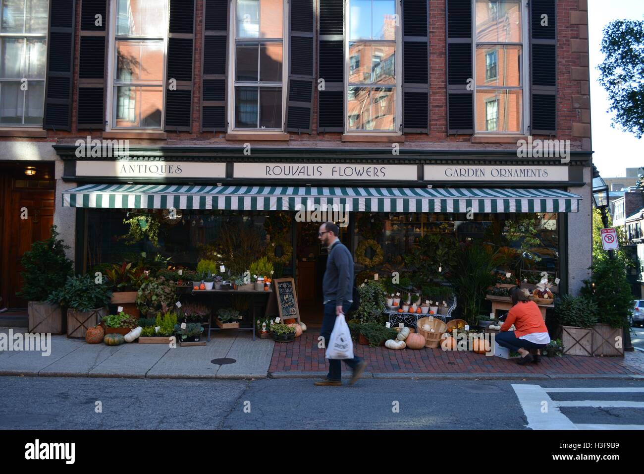 A city flower shop on Beacon Hill in downtown Boston, preparing for