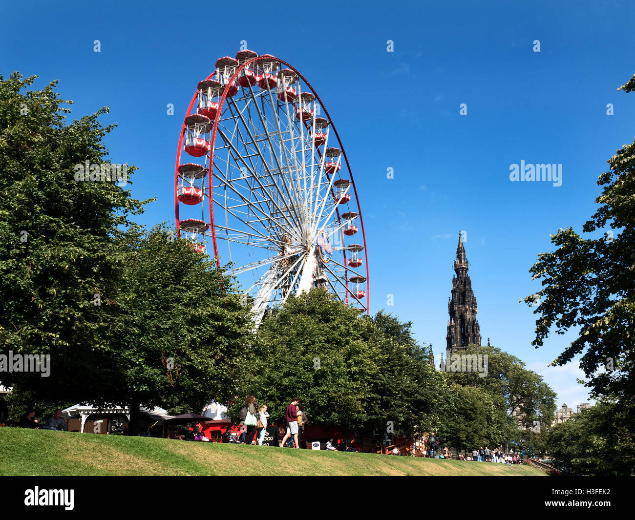 Ferris Wheel and Scott Monument in West Princes Street Gardens Edinburgh Midlothian Scotland Stock Photo