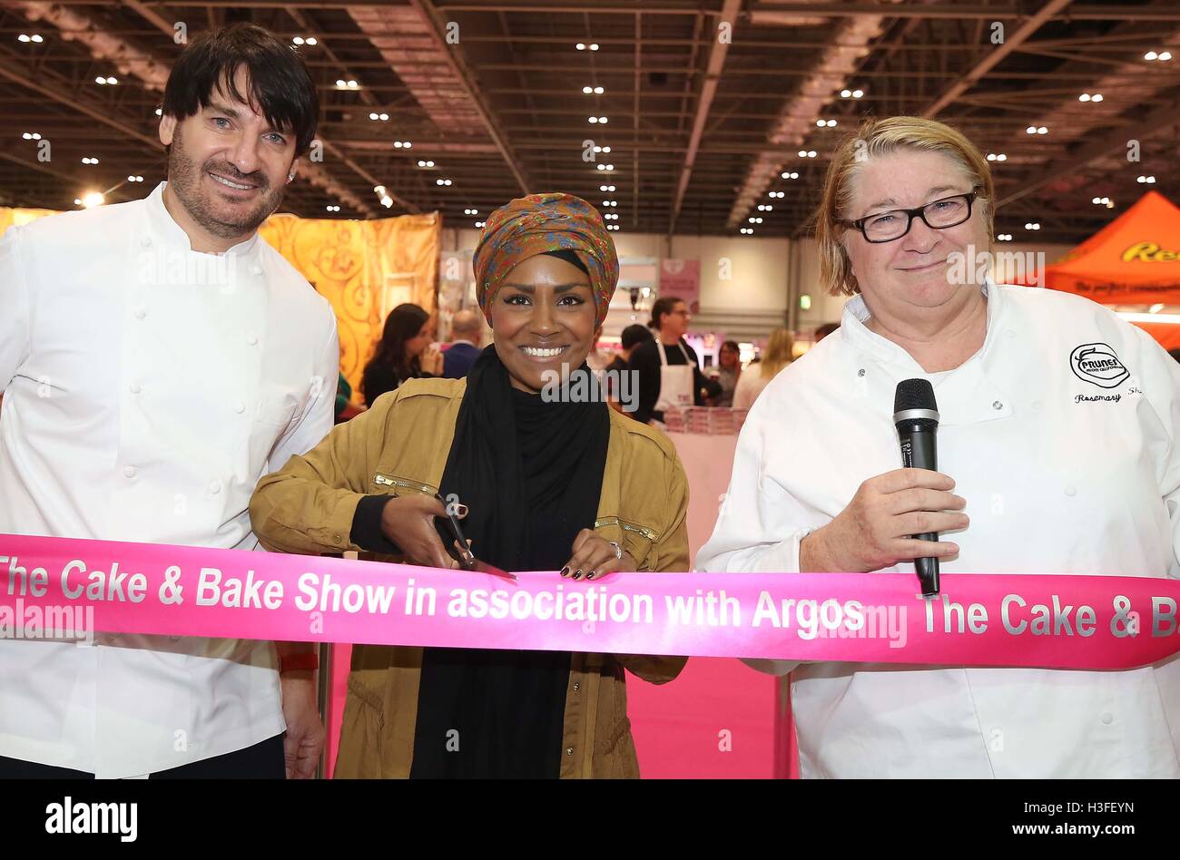 (Left to right) Master patissier Eric Lanlard, Great British Bake Off winner Nadiya Hussain and TV chef Rosemary Shrager open the Cake and Bake Show at ExCeL in London. Stock Photo
