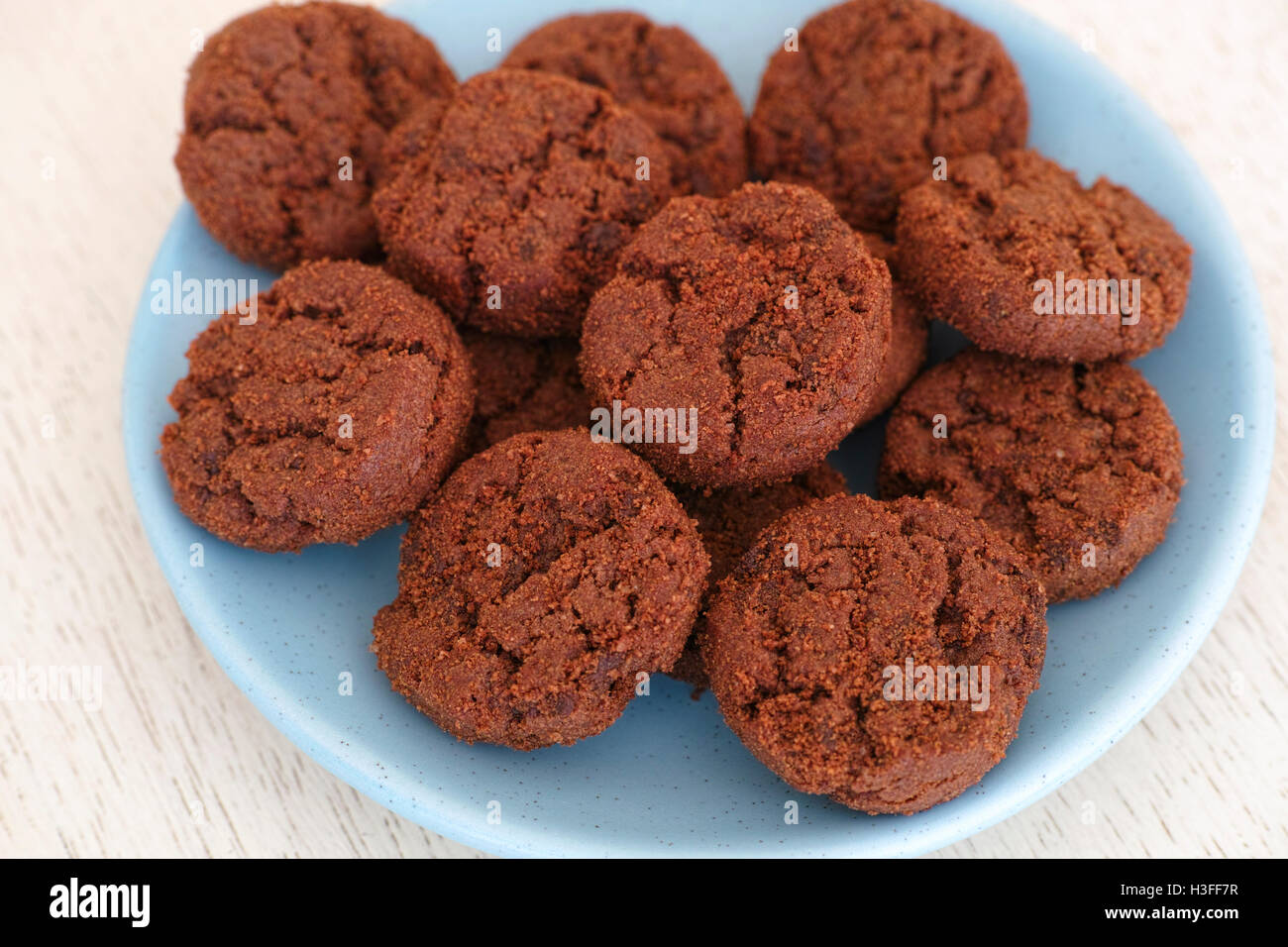 Gluten free cookies with chocolate chips on a blue plate. Close up. Stock Photo