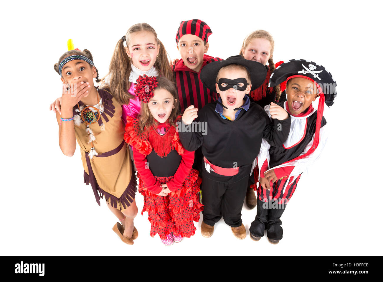 Group of kids in Halloween costumes isolated in white Stock Photo - Alamy