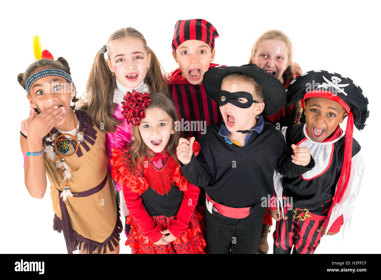 Group of kids in Halloween costumes isolated in white Stock Photo - Alamy