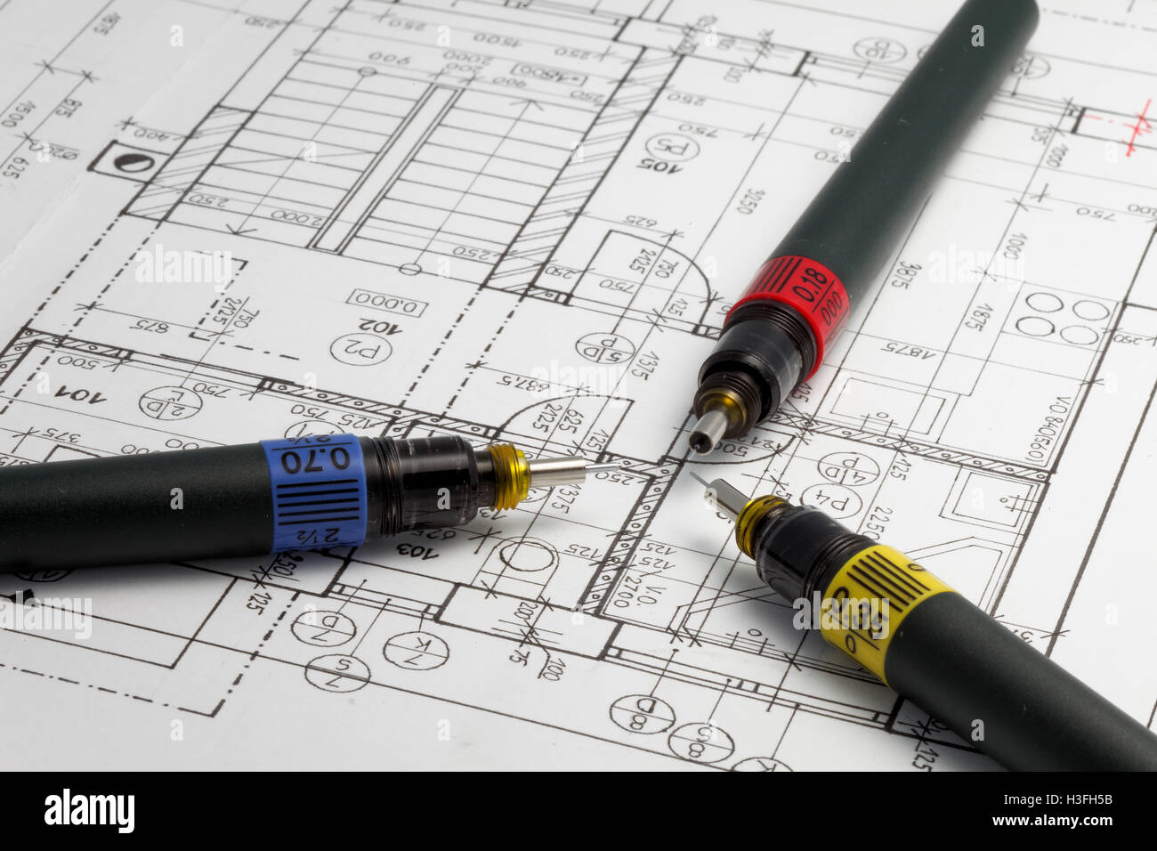 Three basic thicks of special pens for architect on an architect plan. Stock Photo