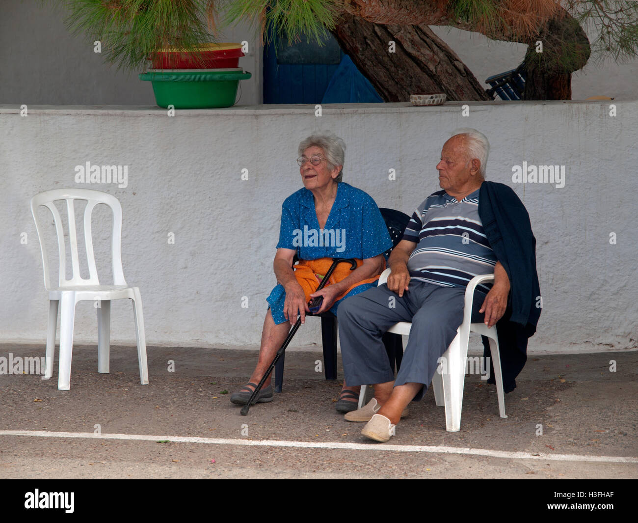 Old greek man sitting on hi-res stock photography and images - Alamy