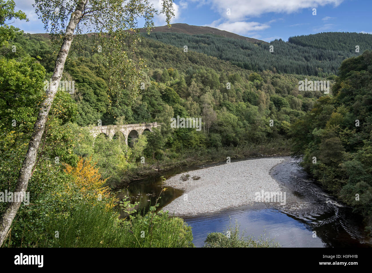Railway viaduct at the Pass of Killiecrankie in Glen Garry, Perth and Kinross, Scotland, UK Stock Photo
