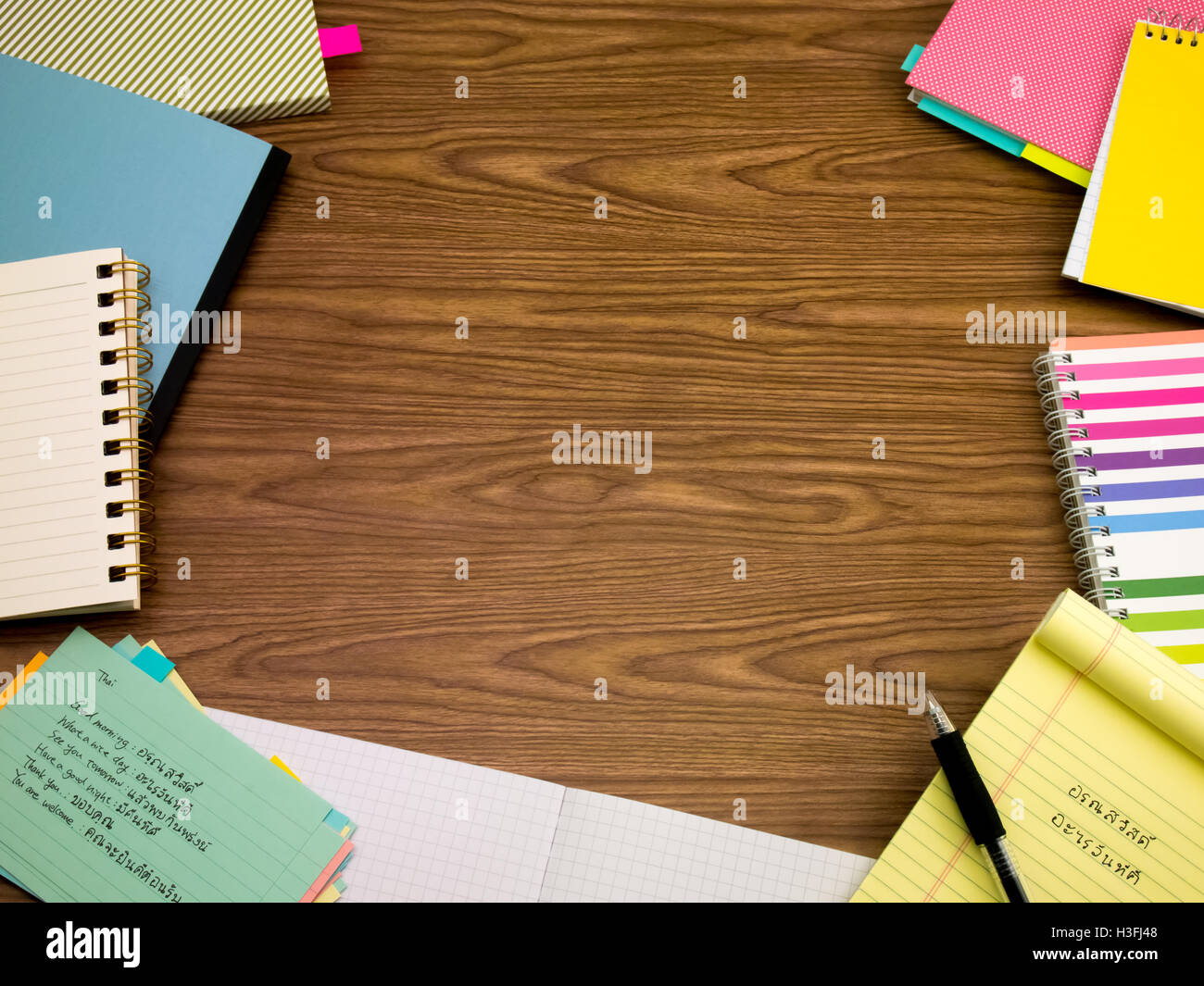 Thai; Learning New Language Writing Words on the Notebook Stock Photo