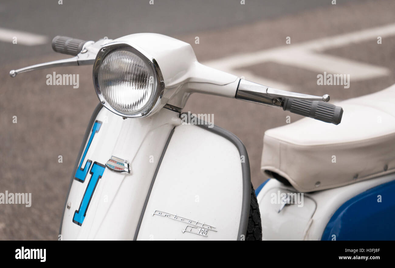 Headlight and Handle Bars on a Lambretta Scooter Detail Stock Photo
