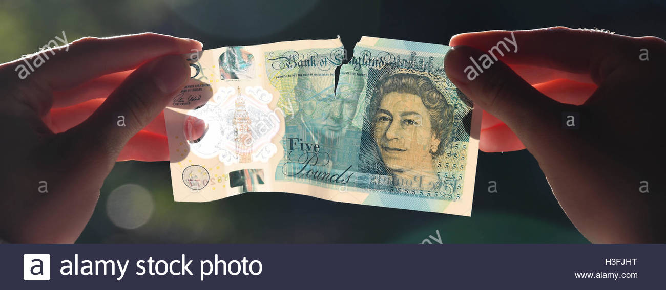 A ripped polymer £5 note, the £5 note was given in change in a shop Stock  Photo - Alamy