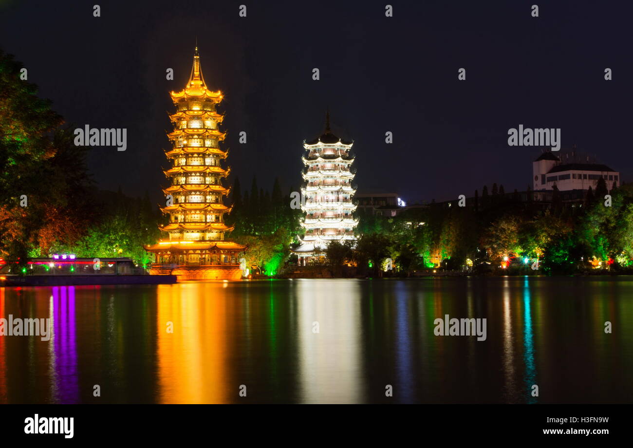Two towers of Guilin China night view Stock Photo