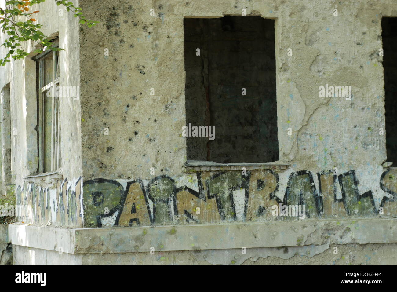 Empty building with paintball sign Stock Photo