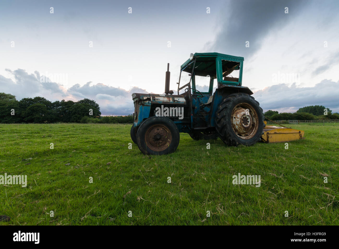 A tractor in a field Stock Photo - Alamy