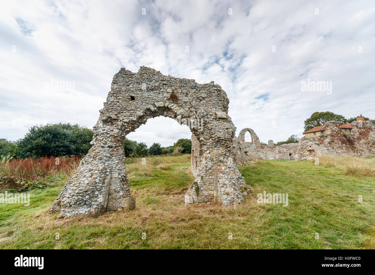 Stone Priory Stone arch at the 14th century ruins of Leiston Abbey, an abbey of ...