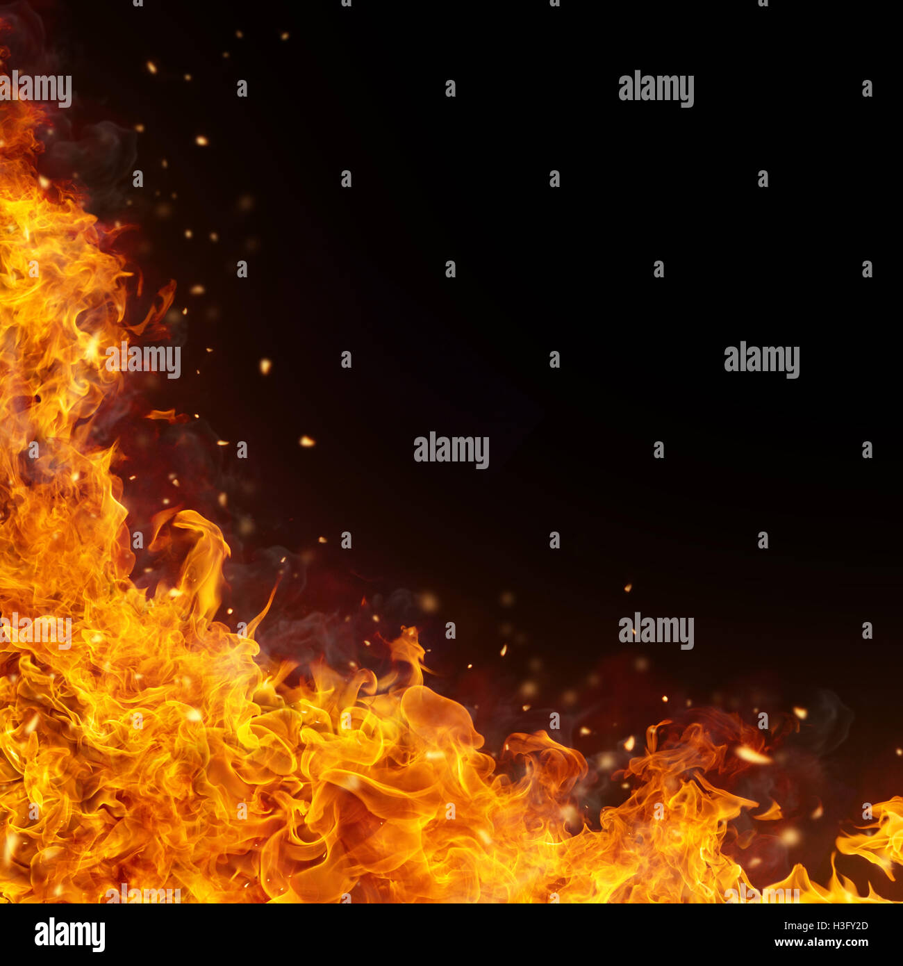 Abstract fire flames background with free space for text. Isolated on black Stock Photo