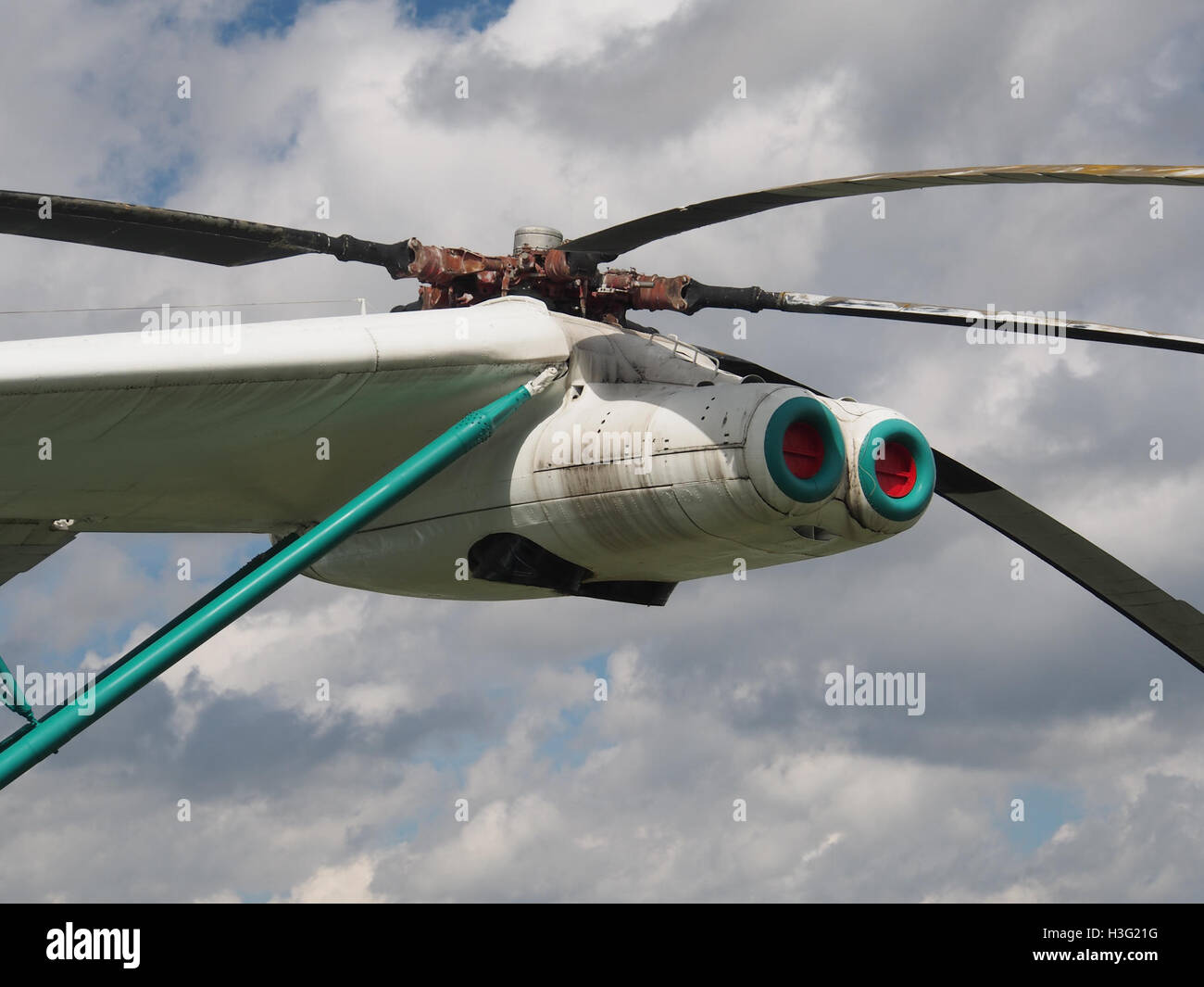 The Mil V-12 (CCCP-21142), a Soviet transport helicopter, is on display at the Central Air Force Museum. This massive helicopter is one of the largest ever built, designed for heavy lifting during the Soviet era. Stock Photo
