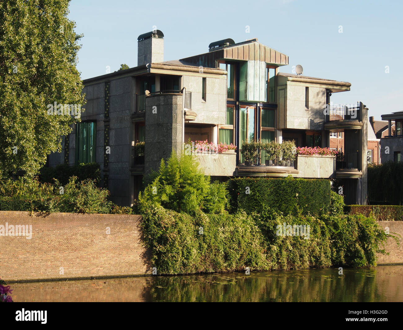 The image shows the rear side of a residential building located on ...