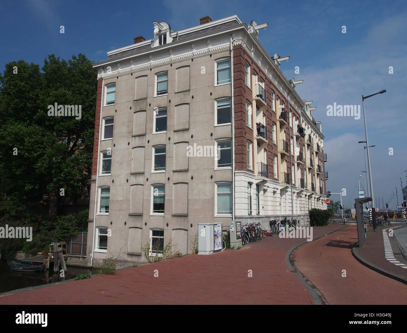 A photograph of the Westerdoksdijk area in Amsterdam, capturing the ...