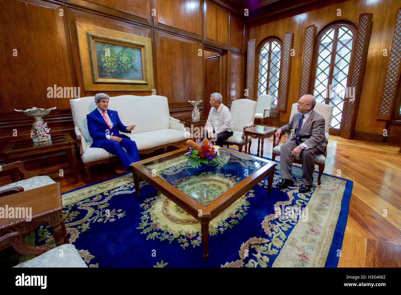 U.S. Secretary of State John Kerry sits with Philippines Foreign Secretary Perfecto Yasay and Assistant Secretary of State for East Asian and Pacific Affairs Daniel Russel in the Malacañang Palace in Manila, Philippines, on July 27, 2016, before the Secretary held a working lunch with Philippines President Rodrigo Duterte. Stock Photo
