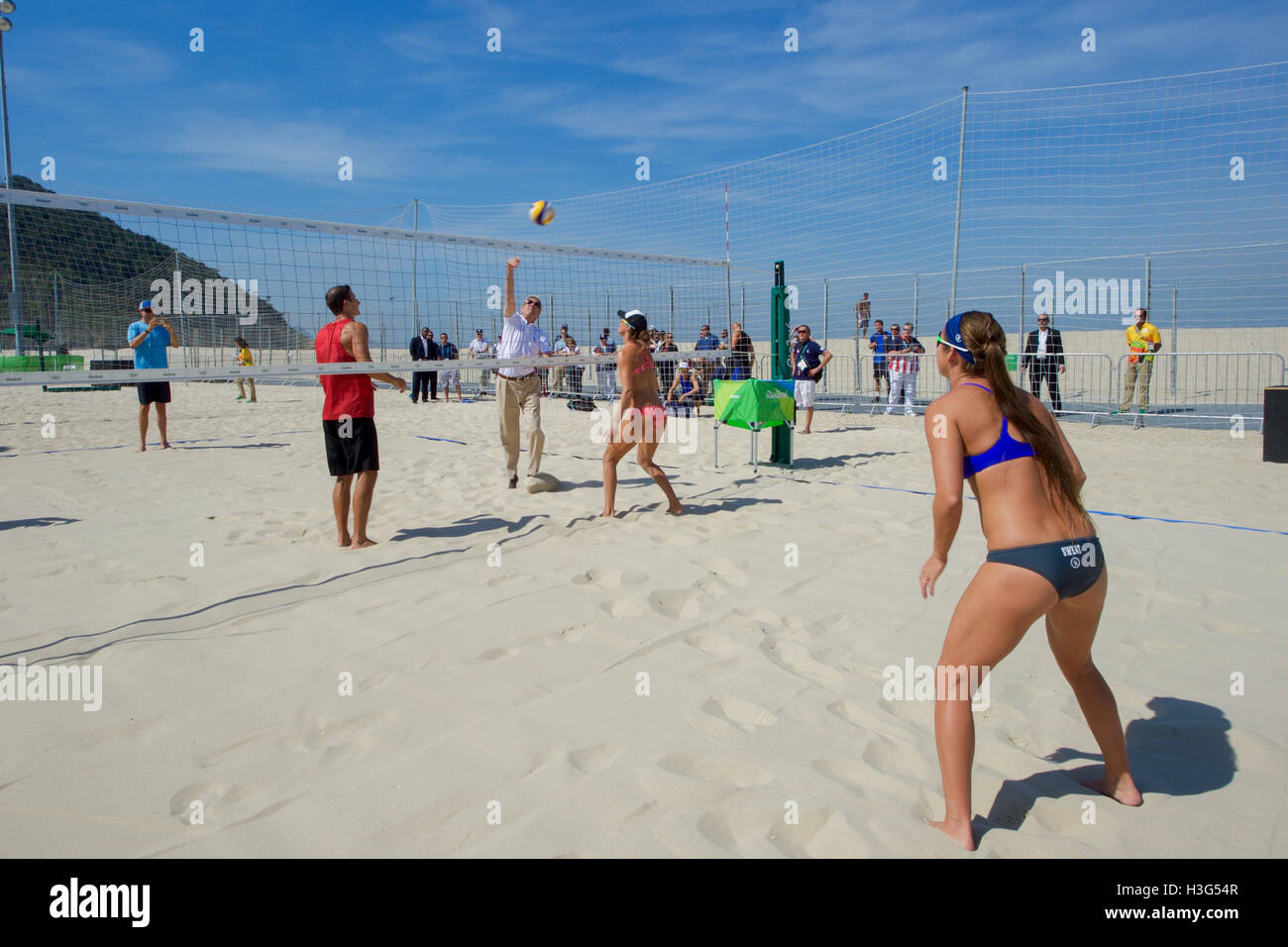 U.S. Secretary of State John Kerry plays with U.S. Olympic women's beach volleyball players on the Copacobana beach in Rio de Janiero, Brazil, on August 6, 2016, as he and his fellow members of the U.S. Presidential Delegation attend the Summer Olympics. Stock Photo