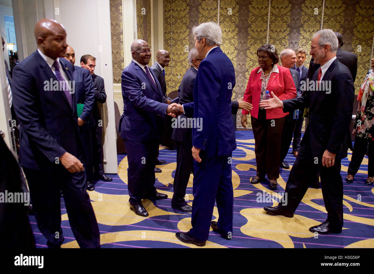 U.S. Secretary of State John Kerry shakes hands with a fellow Foreign Minister on August 22, 2016, at the Villa Rosa Kempinski Hotel in Nairobi, Kenya, before a meeting focused on Somalia between Eastern Africa Ministers from Kenya, Ethiopia, Somalia, South Sudan, Sudan, and Uganda. Stock Photo