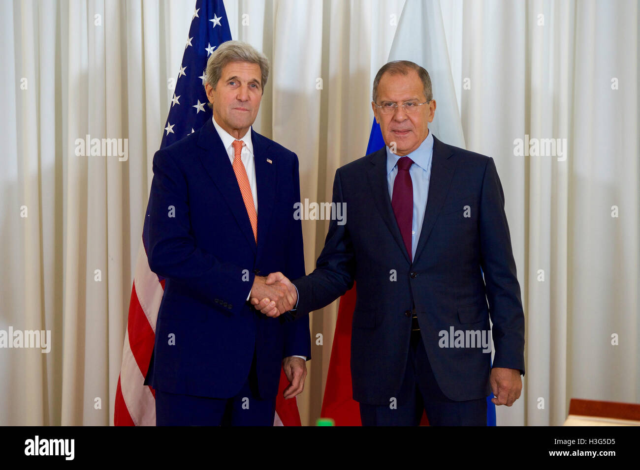 U.S. Secretary of State John Kerry shakes hands with Russian Foreign Minister Sergey Lavrov before a bilateral meeting on August 26, 2016, at the President Wilson Hotel in Geneva, Switzerland. [State Department photo/ ] Stock Photo