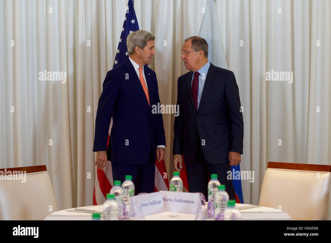 U.S. Secretary of State John Kerry chats with Russian Foreign Minister Sergey Lavrov before they take their respective seats for a bilateral meeting on August 26, 2016, at the President Wilson Hotel in Geneva, Switzerland. [State Department photo/ ] Stock Photo