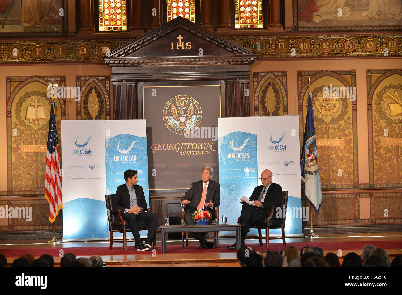 Secretary of State John Kerry, speaks during a panel discussion with Actor and Environmentalist Adrian Grenier and Dean of Georgetown University's Walsh School of Foreign Service Dr. Joel Hellman during the Our Ocean, One Future Leadership Summit held on the Georgetown University Campus on September 16, 2016. [State Department photo/ ] Stock Photo