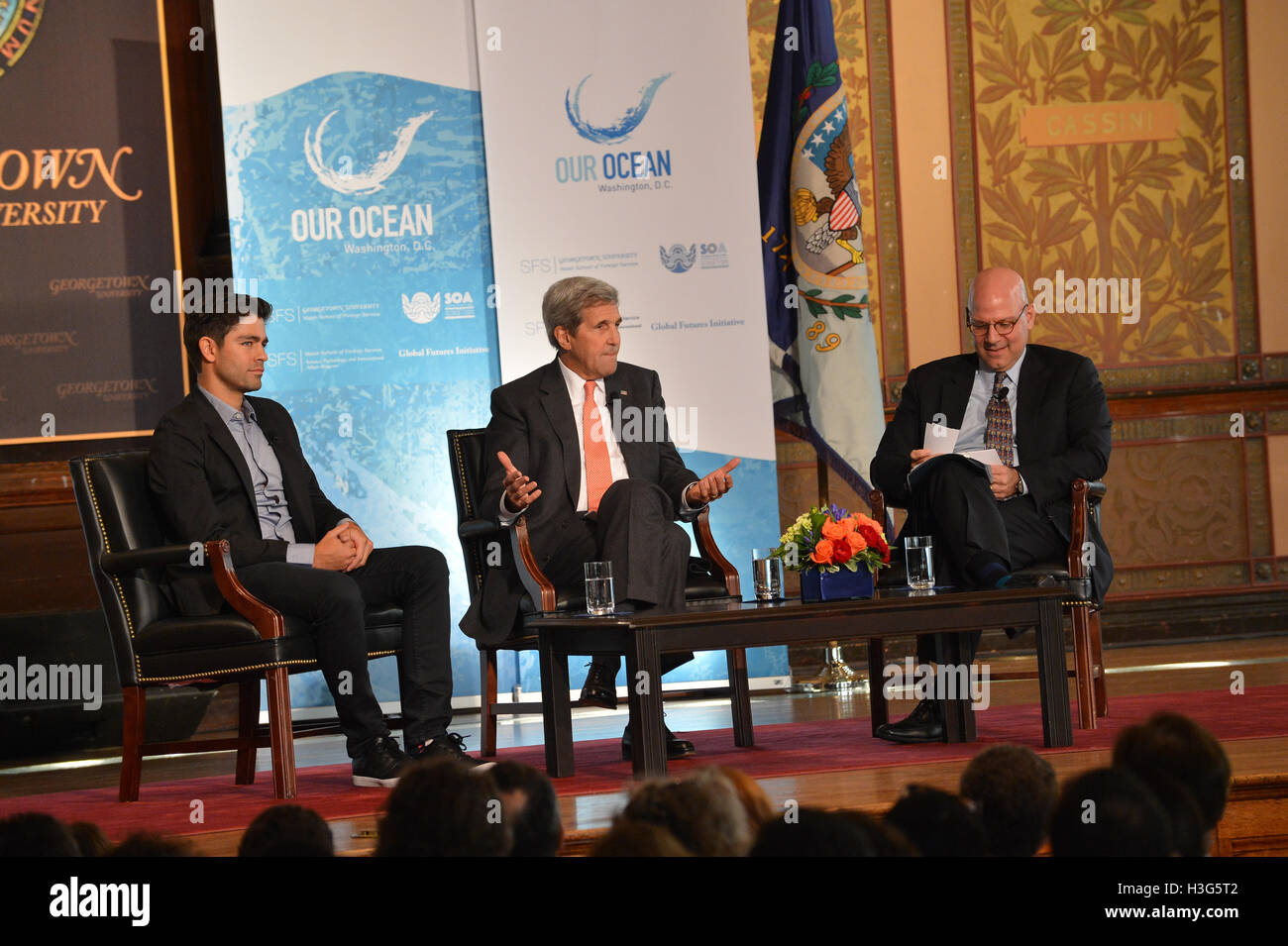 Secretary of State John Kerry, speaks during a panel discussion with Actor and Environmentalist Adrian Grenier and Dean of Georgetown University's Walsh School of Foreign Service Dr. Joel Hellman during the Our Ocean, One Future Leadership Summit held on the Georgetown University Campus on September 16, 2016. [State Department photo/ ] Stock Photo
