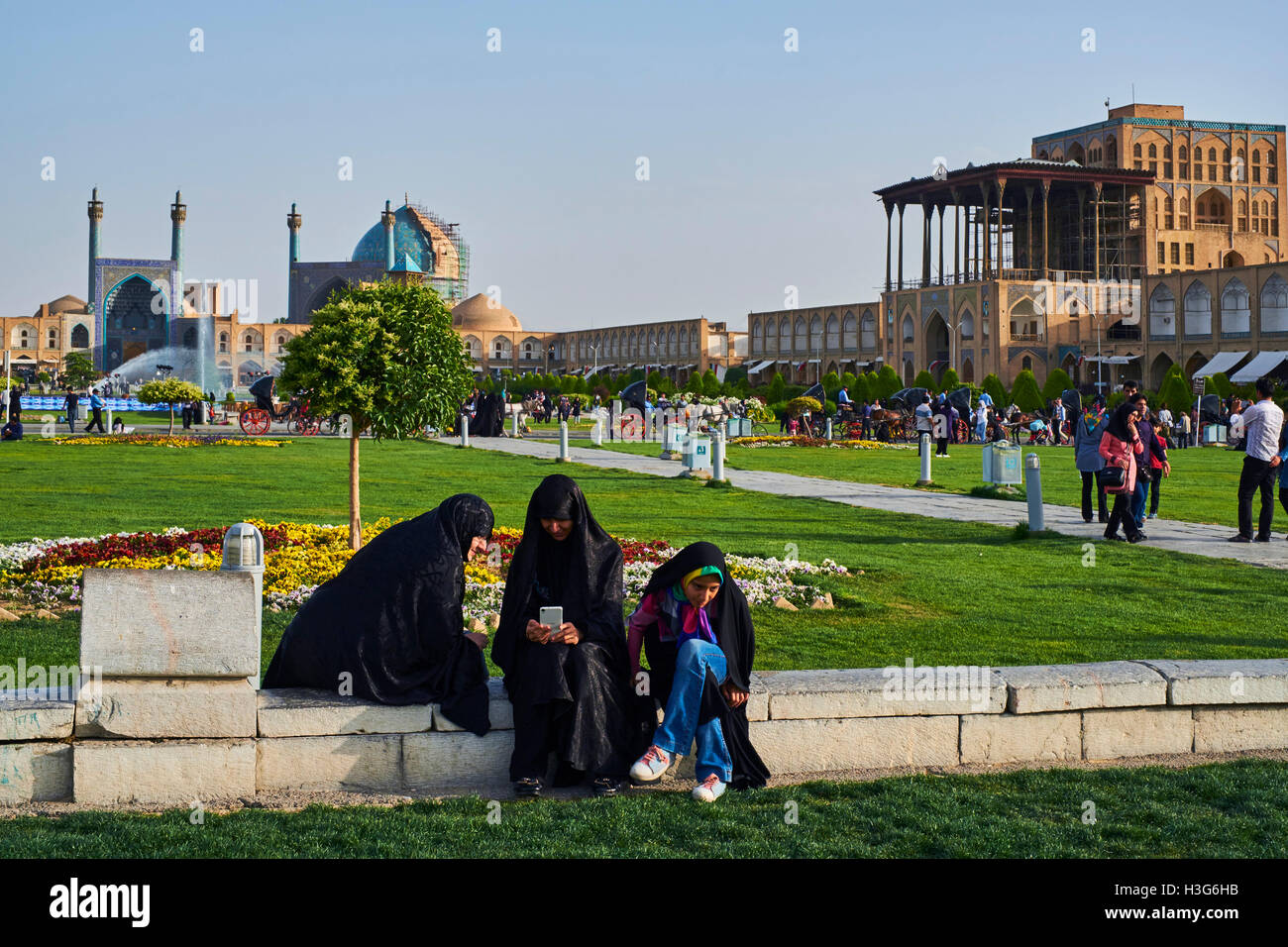 Iran, Isfahan, Imam Square, Jameh Mosque or Friday mosque and Ali Qpu Palace, world heritage of the UNESCO Stock Photo