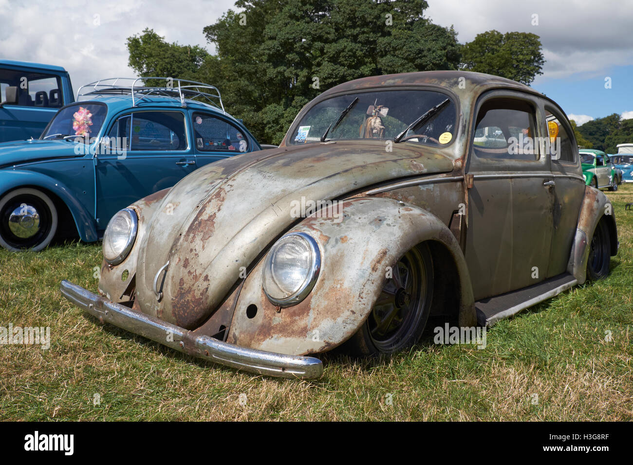 A 'rat look' lowered VW Beetle at the Viva Skeg Vegas Classic VW Show, Revesby Park, Lincolnshire, UK. Stock Photo