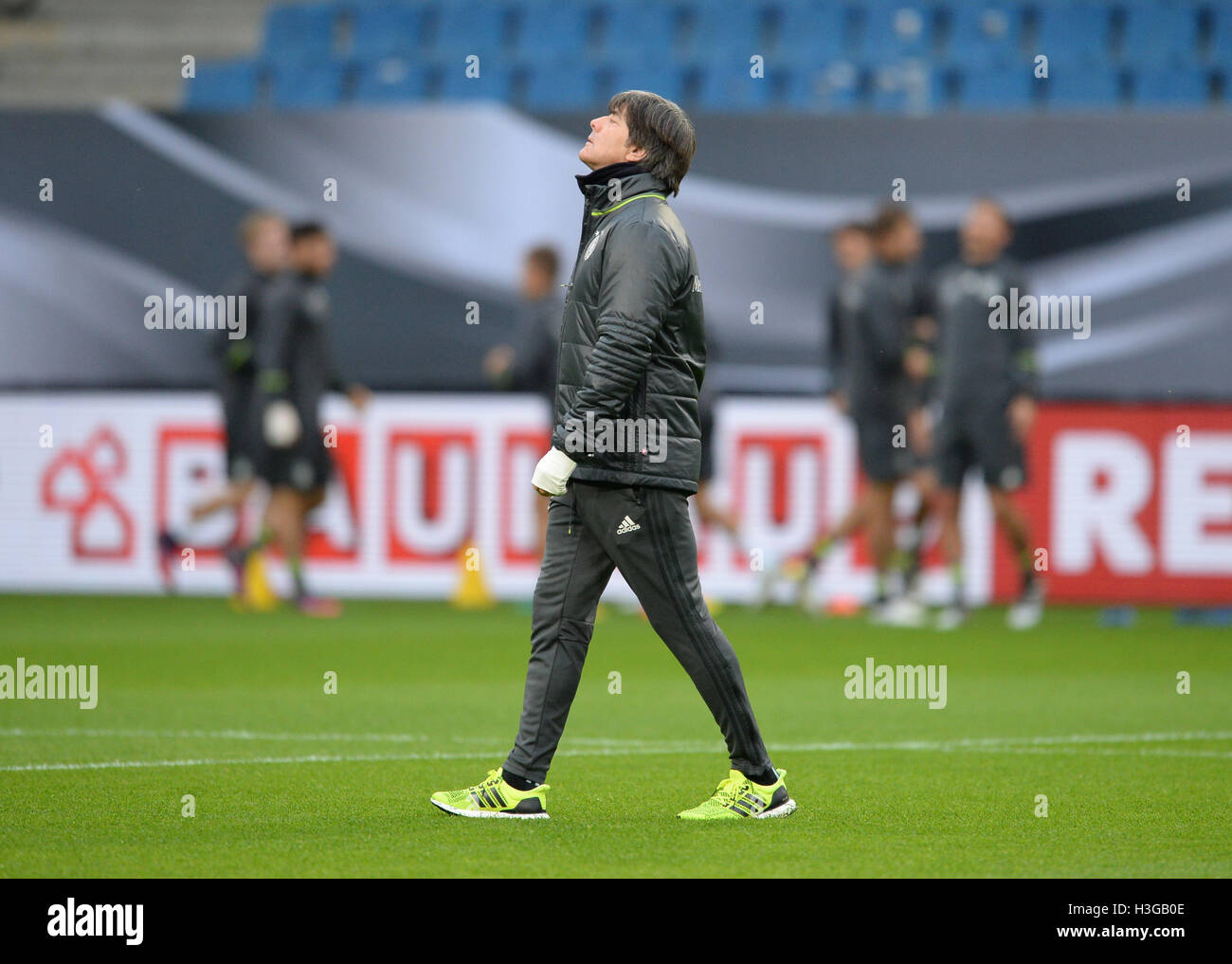 Hamburg, Germany. 7th Oct, 2016. Headcoach of the German national soccer team Joachim Löw stands in the Volksparstadium in Hamburg, Germany, 7 October 2016. Germany is to play against the Czech Prepublic to qualify for the next World Cup on the 8 October 2016. Photo: Daniel Bockwoldt/dpa/Alamy Live News Stock Photo