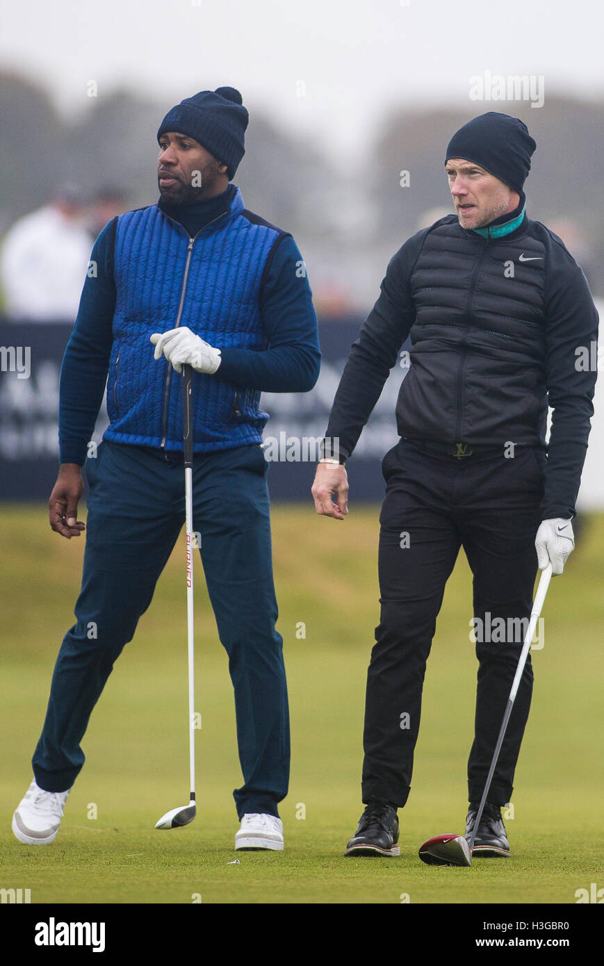 Carnoustie Golf Course, Fife, Scotland. 07th Oct, 2016. Alfred Dunhill Links Championship Golf 2nd Round. Ronan Keating's teeing off on the 4th hole as Jonathan Joseph watches on Credit:  Action Plus Sports/Alamy Live News Stock Photo