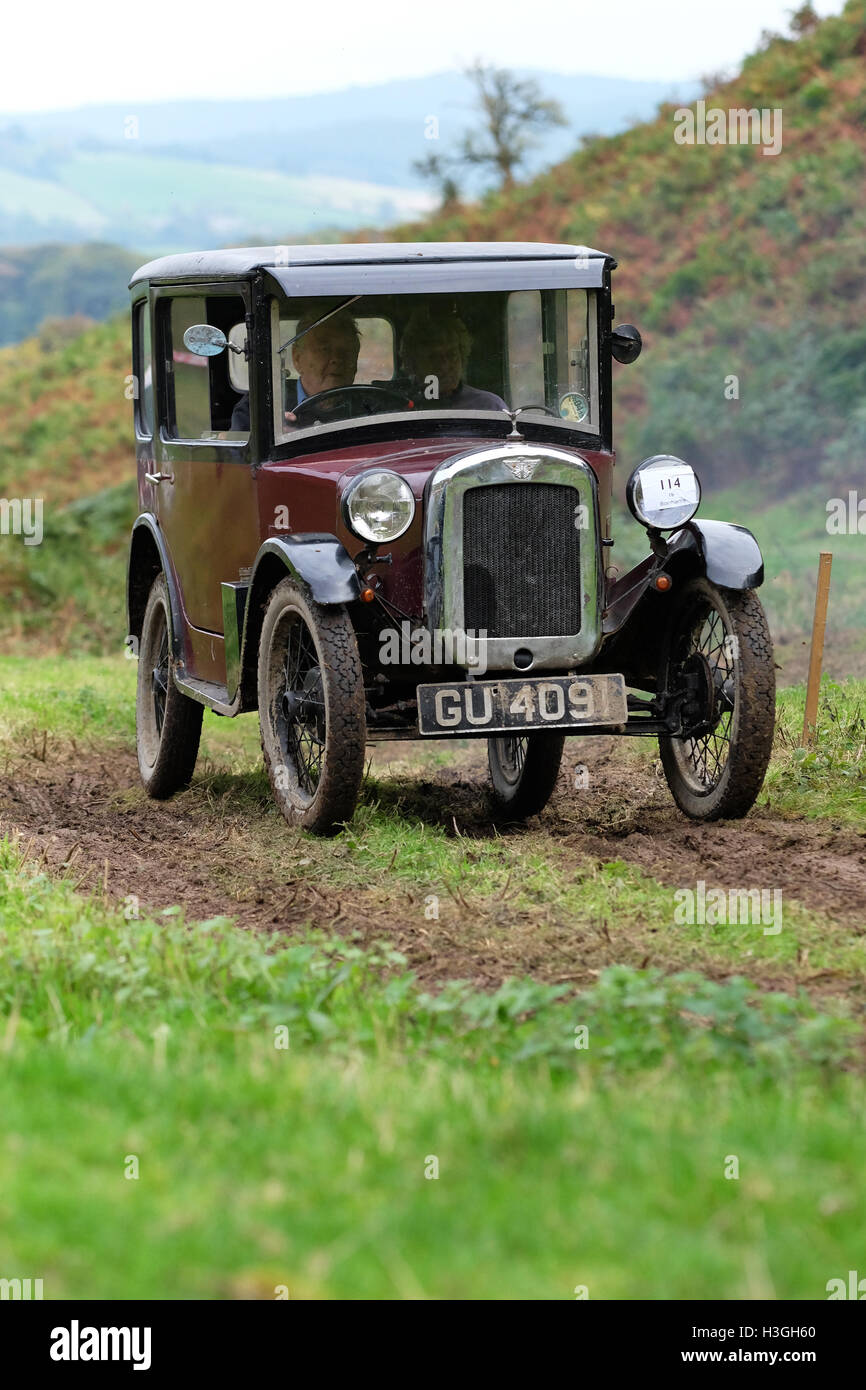 Badlands Farm, Kinnerton, Powys, Wales, UK - Saturday 8th October 2016 - Competitors in a 1929 Austin 7 Saloon take part in the Vintage Sports-Car Club ( VSCC ) hill climb at Badlands a long muddy track and hillside climb in Powys. Competitors earn points not for speed or time but how far up the hill they manage to drive their vintage sports car. Stock Photo